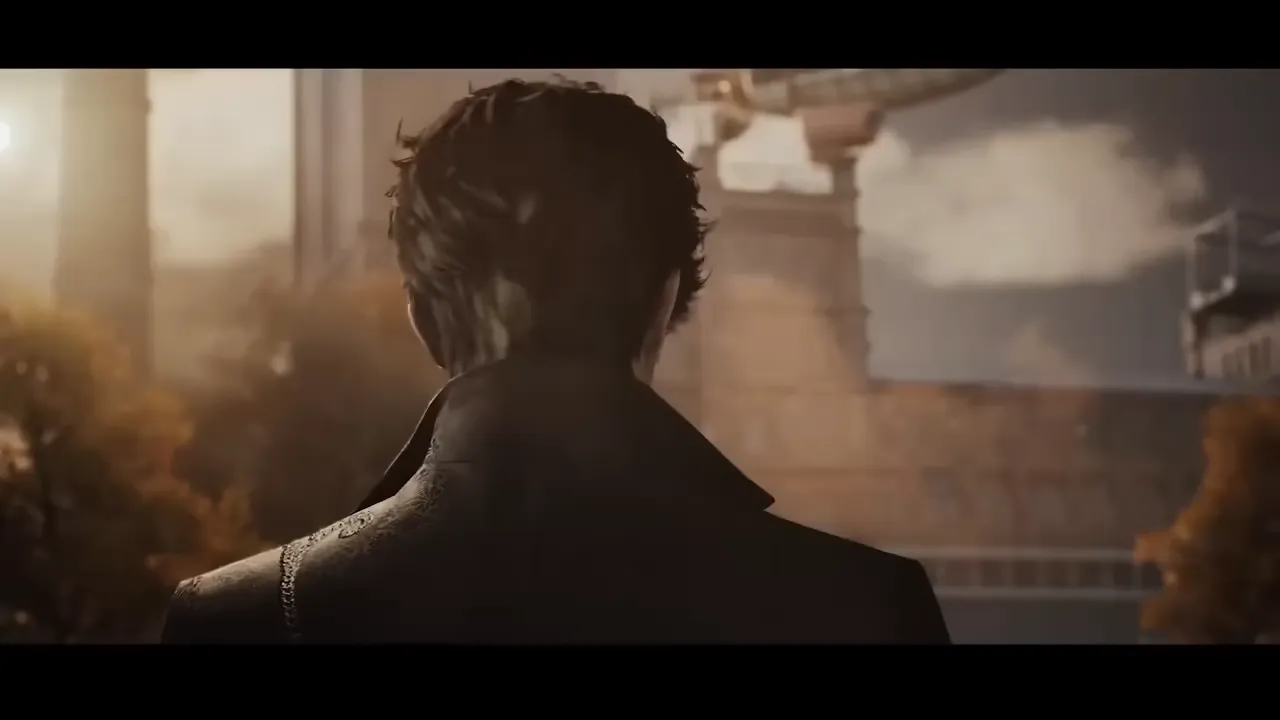 Dark-haired man seen from behind overlooking a sunset city